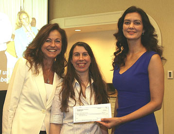 Melissa presents check to non-profit in Santa Monica